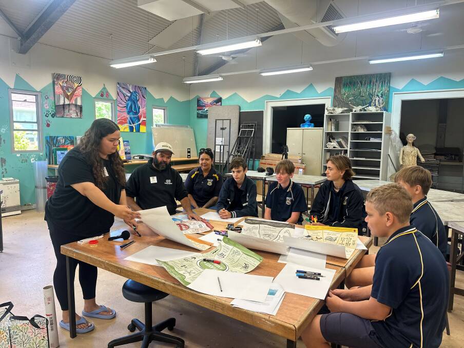 Busselton High School Waalitj Kaaditjin Academy students and their teacher Gwendoline Gray taking part in a design workshop with Indigenous artist Mariah Yarran and local custodian Zac Webb.